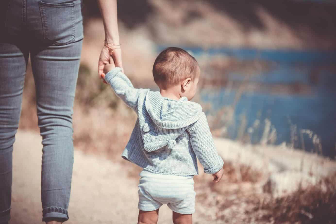 fort collins child custody lawyer, consider joint custody, parent holding child's hand