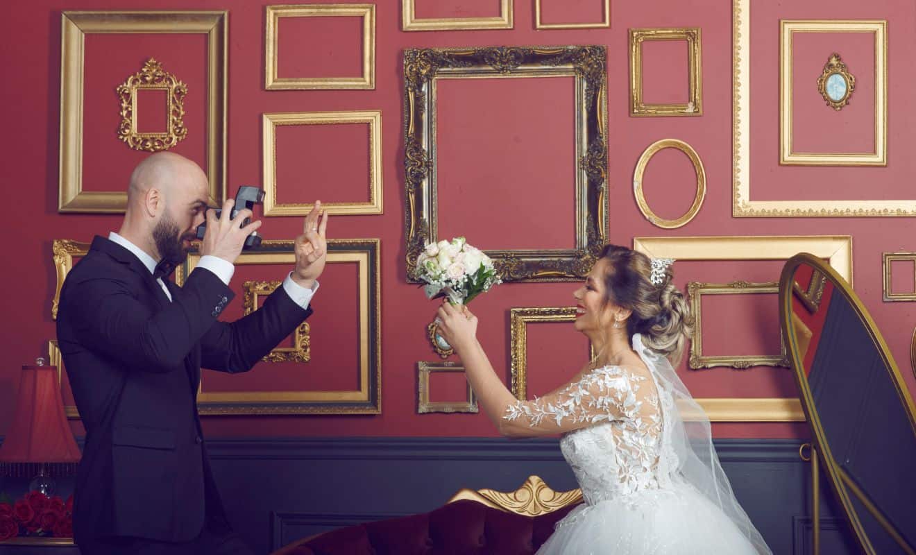 A couple getting married after a divorce and looking happy.