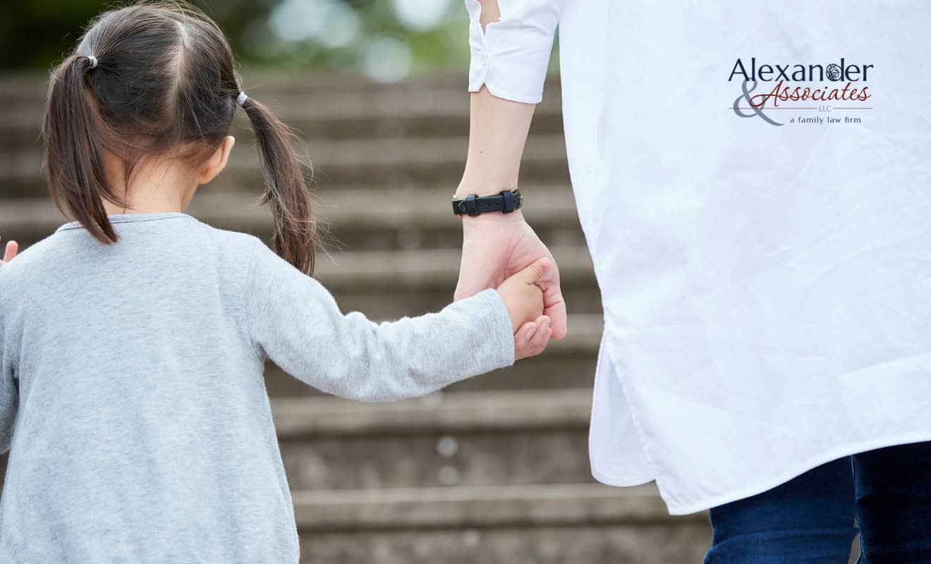 Child-Custody-in-Colorado A single parent take their kid out to the park.