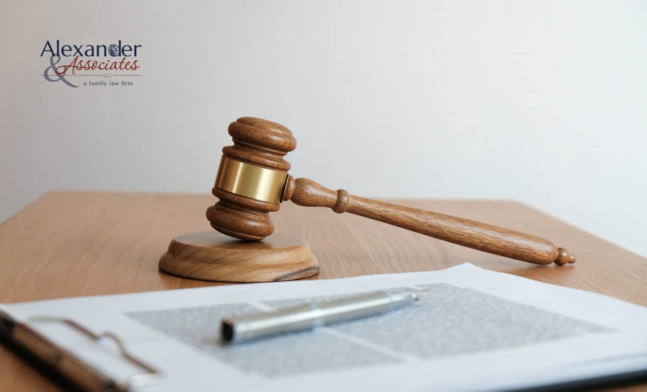 Post-Decree-Modifications-in-Colorado A gavel and a legal child custody document on a table.